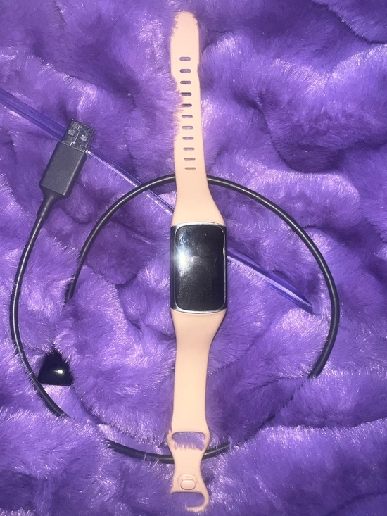 fitbit Other - Fitbit charge 5. Tan band, and comes with charger.